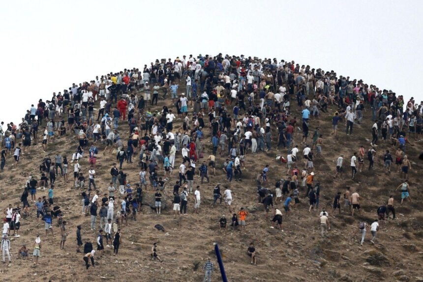 Thousands cross into Spain's north Africa enclave in new migrant crisis