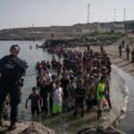 Spain installs floating barrier in Ceuta after deadly influx of migrants