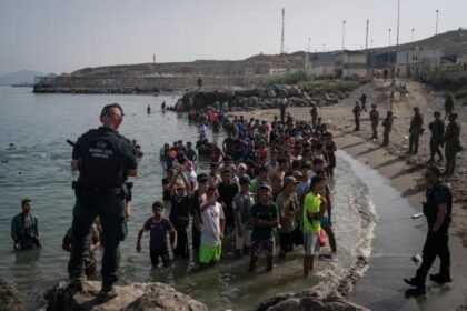 Spain installs floating barrier in Ceuta after deadly influx of migrants